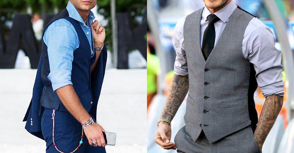 身著灰色西裝背心及深藍色西裝背心的男士