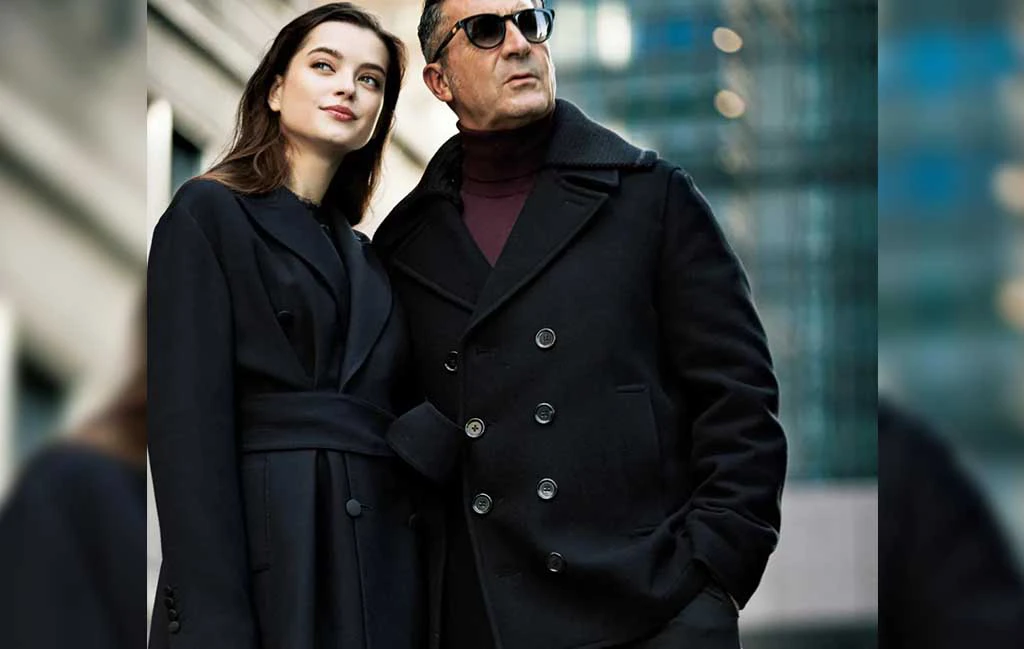 男人與女人都穿著黑色的大衣